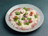Beef carpaccio with kimchi tomatoes