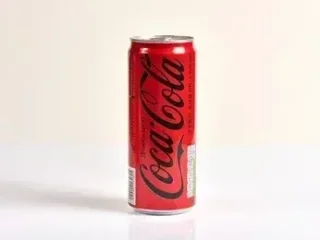 Напій Coca-Cola 0,33л ж/б без цукру