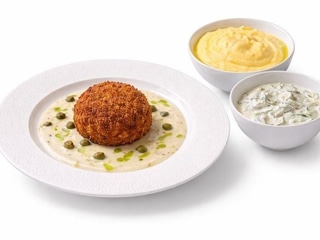 200g Smažený holandský řízek z telecího masa panko strouhanka, velouté s kapary, bramborová kaše, máslo, okurkové tzatziki