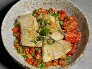 Хек на овочевій подушці