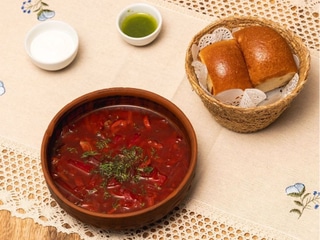 Beef borscht with pampushki, sour cream and garlic sauce