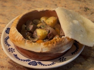 Veal cheeks slow-cooked in clay pot