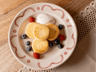 Syrniki - Cottage cheese pancakes with fresh berries