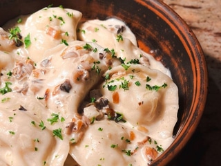 Potato dumplings with mushroom sauce