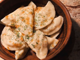 Potato dumplings with sour cream