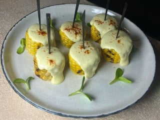 Кукурудза гриль під сирним соусом