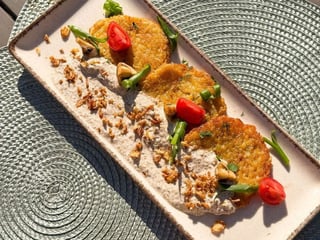 Деруни з грибним соусом